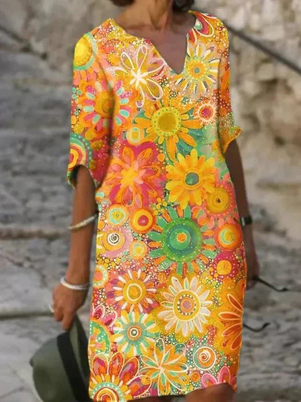 Annie | Livfull blommig midiklänning
